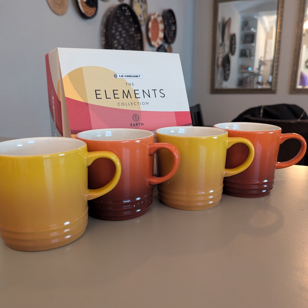 Le Creuset Yellow and Orange Stoneware Mugs Set